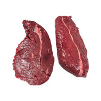 Two raw bison (buffalo) hanger steaks on a white background