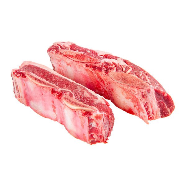 Two raw, grass-fed beef flanken-cut short ribs, arranged parallel to each other.